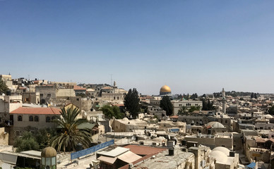 Fototapeta na wymiar Golden Dome and nearby cityscape in Jerusalem, Israel