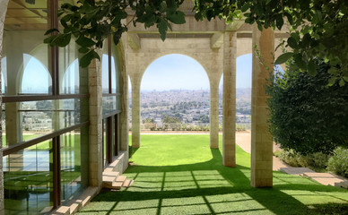 Fototapeta premium Beautiful architectural brick arch on a sunny day, overlooking the city of Jerusalem, Israel