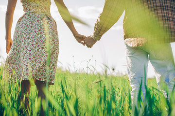 Couple in love. Help. Hands concept. Sensual. Nature background. Love photo. Valentine day. Holidays. Romantic lovers. Romance. Lovely.
