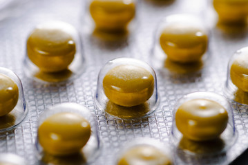 Close up on pills in a sealed blister pack
