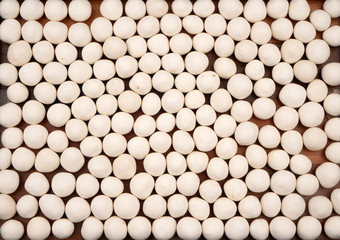 Organic white coated chickpeas. For texture or background.