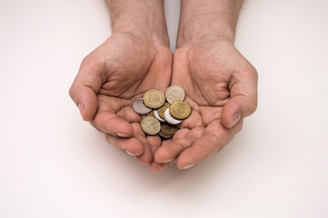 Poor man's hands with russian coins, poverty concept