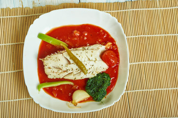 Herb  garlic baked cod with romesco sauce