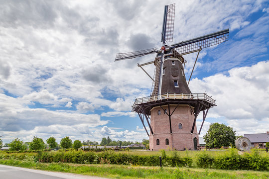 Dutch windmill Puurveense molen in small village Kootijkerbroek, on the Veluwe, in the municipality of Barneveld, Gelderland, Netherlands.