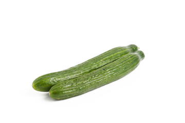 Two European cucumbers isolated on white background.