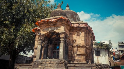 Old temple with brick walls and brown roof