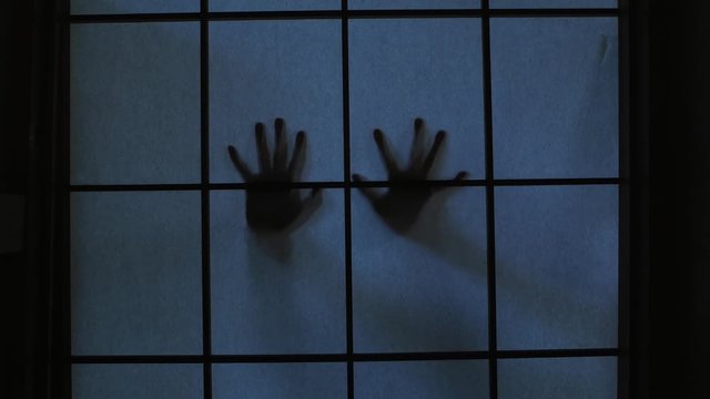 Spectral hands hitting Japanese Paper Screen Door with sound