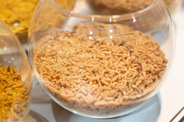 close up photo with selective focus of maggots for fishing - natural bait