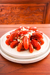 Chinese food with minced garlic and crawfish