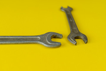 working tools. wrench for housework. colored background. tools for the house. steel reliable wand keys on a colored background. tools for manual worker