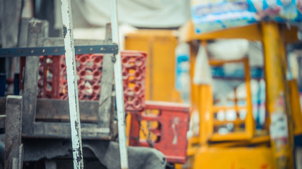 Red crates with orange wall at the back