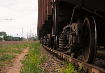 Fototapeta na wymiar Freight train composition in the evening is brown