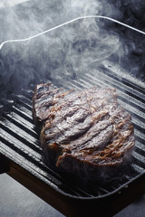 Beef steak fried on a grill, close-up