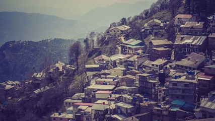 Rows of houses and roof on hill