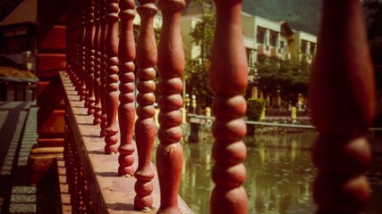 Rows of red pillars of a railing