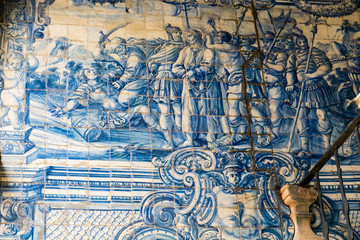 beautiful hand painted azulejos tiles Obidos Portugal. Historic tile panel depicting a scene