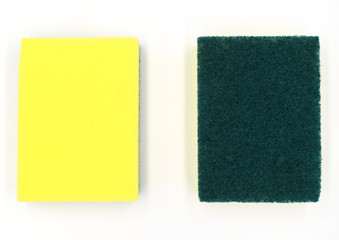 Green scourer isolate on white background.A tool used to scour, usually used to clean cookware. A scourer may be in the form of a mesh  of wiresor a pad with a soft sponge-like side.