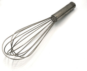 Egg beater isolate on white background. A hand tool that is used to manually mix and beat eggs or other similar ingredients