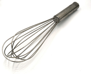 Egg beater isolate on white background. A hand tool that is used to manually mix and beat eggs or...