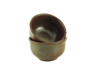 Empty brown bowl stack isolated on a white background..