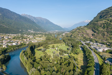Fototapeta na wymiar Bartesaghi park and Adda river, Valtellina