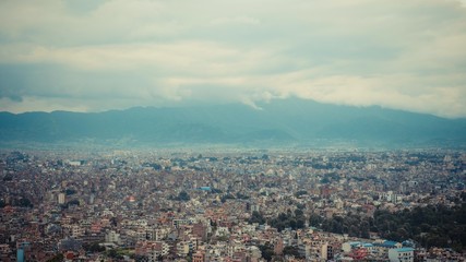 Top view of the city with mountain in the back
