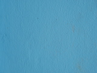 Blue color painted on concrete wall texture background