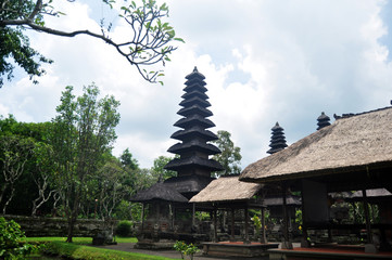 Ancient Meru towers of Pura Besakih temple significant Hindu archaeological site for travelers people travel visit and respect praying at Mount Agung city village in Bali, Indonesia