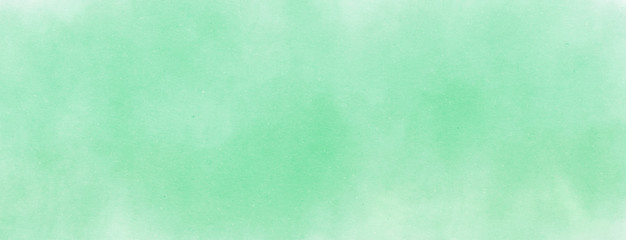 Abstract Green Water color background on paper with spotted blank copy space