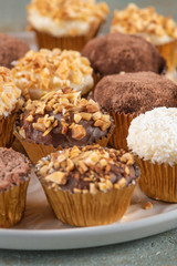 Brigadeiro is a common Brazilian dessert. Delicious chocolate candy Brigadeiro on a table