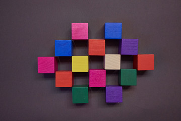 colored wooden cubes for development and play at home