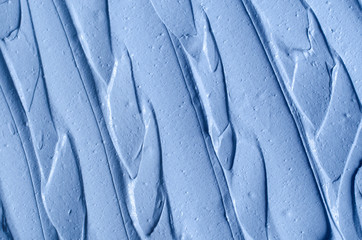 Light blue bentonite facial clay (alginate mask, face cream, body wrap) texture close up, selective...