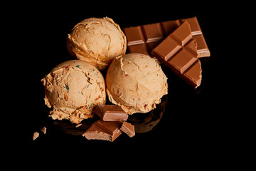 fresh delicious chocolate ice cream isolated on black