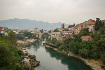Stari Most, also known as Mostar Bridge, is a rebuilt 16th-century Ottoman bridge in the city of Mostar in Bosnia and Herzegovina that crosses the river Neretva and connects the two parts of the city