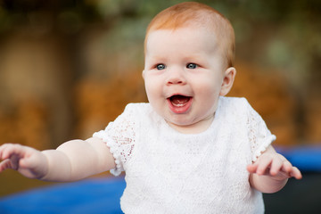 Portrait of cute seven month old baby girl