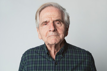 Displeased senior man in a studio shoot