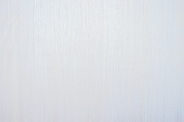 Wooden background covered with white paint. The tree texture is visible. Background and texture