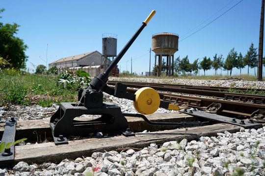 Hardened steel railroad tracks photographed on a sunny spring day