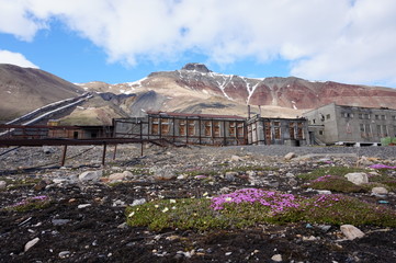 The old Russian ghost town Pyramiden on Spisbergen. An abandoned coal mine and the mountain called Pyramiden.