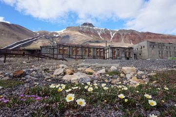 The old Russian ghost town Pyramiden on Spisbergen. An abandoned coal mine and the mountain called...