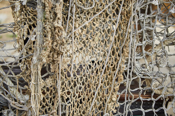 A fishing net hung for drying.