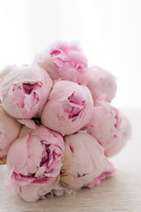 Obraz na płótnie Canvas Beautiful Bridal bouquet of pink peonies