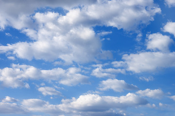 Blue sky with white clouds. The concept of the ozone layer, protection of nature, clean air.