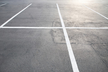 Fototapeta premium Empty parking lot car, marked with white lines. 