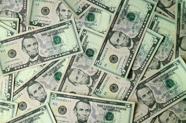 Top View of Heap of United States Five Dollar Bills