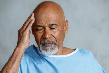 Senior patient having a headache
