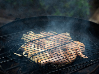 Grilled chicken on the grill