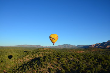 Flying in hot air balloon in the mountains in Sedona Arizona USA