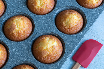 Closeup homemade magdalenas,the typical spanish muffins