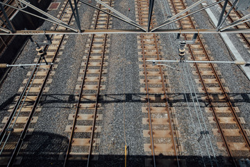 The railways are surrounded by many stones